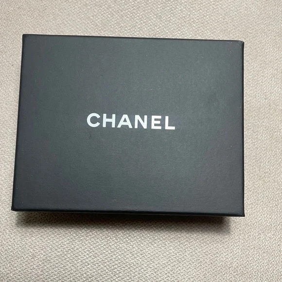 Authentic CHANEL Silver and Crystal Logo Earrings - Picture 2 of 7